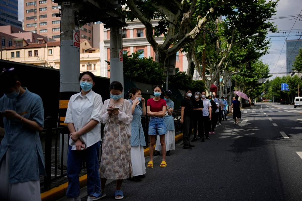 Shanghai kicks off new round of mass Covid testing, Beijing cases jump