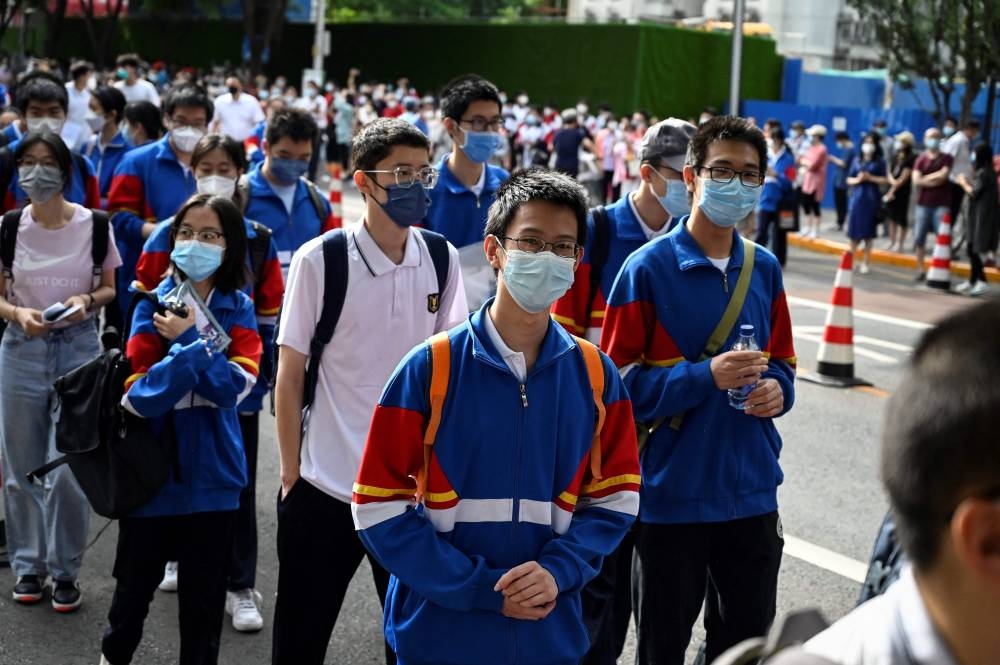 Beijing delays school re-openings after new Covid outbreak