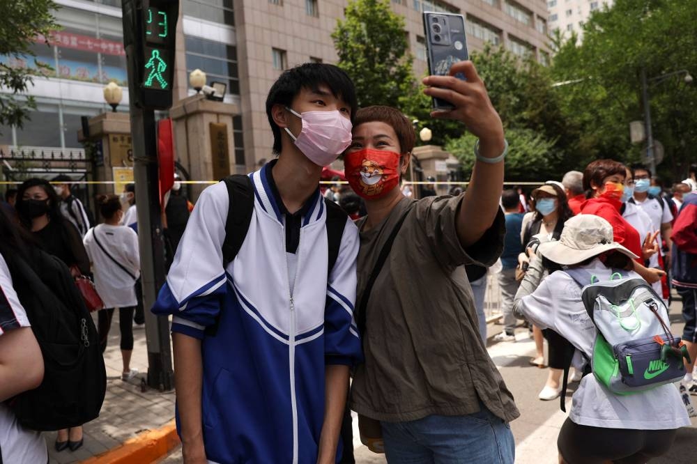 Beijing warns of ‘explosive’ Covid outbreak as Shanghai begins mass testing