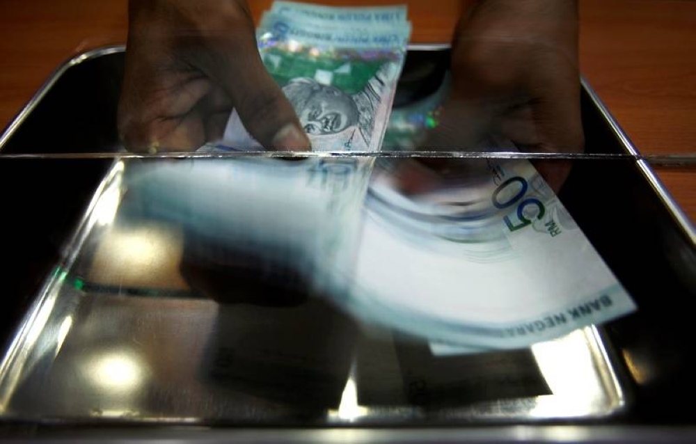 The only sectors which saw net buying by foreign investors were consumer, healthcare and property, amounting to RM23.6 million, RM7.2 million and RM4.8 million, respectively. — Reuters pic