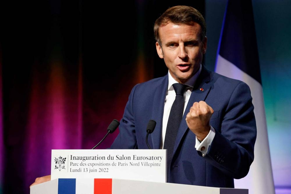 French President Emmanuel Macron delivers a speech during the opening of the Eurosatory land and airland defence and security trade fair, at the Paris-Nord Villepinte Exhibition Centre in Villepinte, north of Paris, on June 13, 2022. — AFP pic