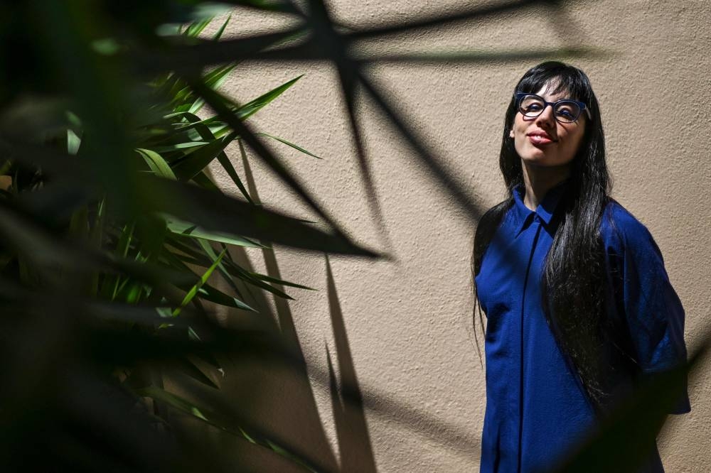 Argentinian artist Sofia Crespo poses for a photo at her home in Lisbon on June 8, 2022. — AFP pic