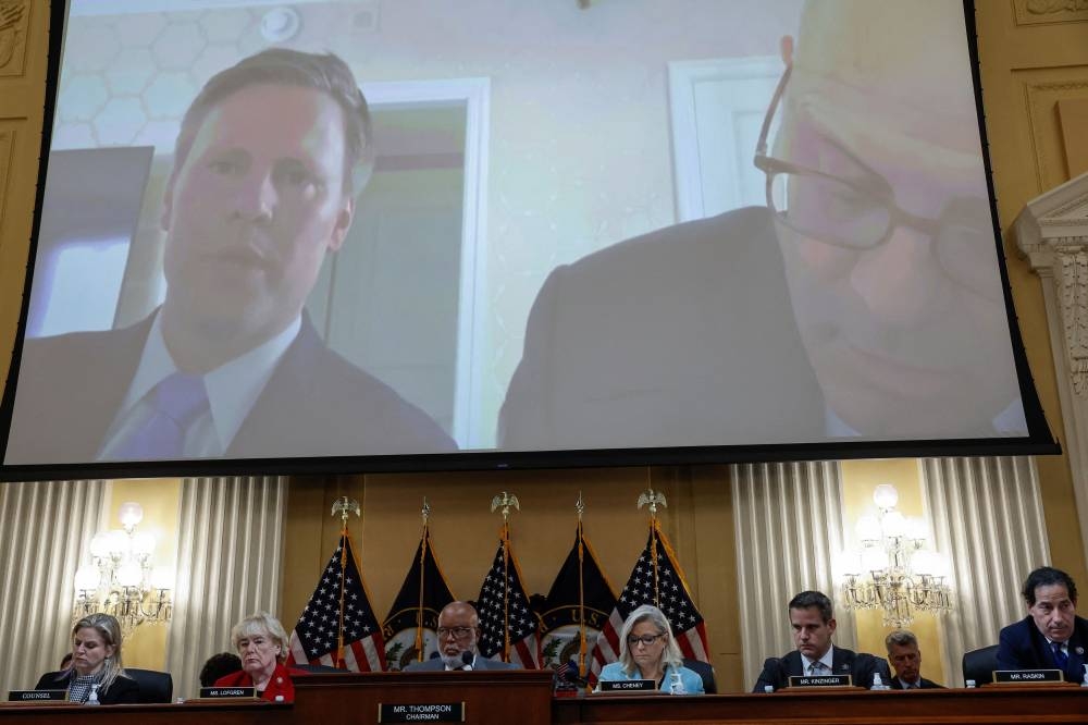 Bill Stepien, former Donald Trump’s campaign manager is seen displayed on screen as US Representative Zoe Lofgren (D-CA), Chairperson Bennie Thompson (D-MS) , Vice Chair US Representative Liz Cheney (R-WY)  and US Representative Adam Kinzinger (R-IL)  hold the second public hearing of the US House Select Committee to Investigate the January 6 Attack on the United States Capitol, at Capitol Hill, in Washington  June 13, 2022. — Reuters pic