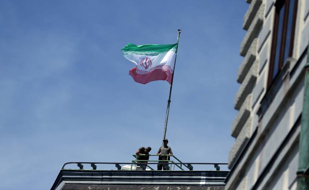 The national flag of Iran is seen on top of the Austrian Chancellery during the visit of President Hassan Rouhani in Vienna in this file picture taken on July 4, 2018. — Reuters pic