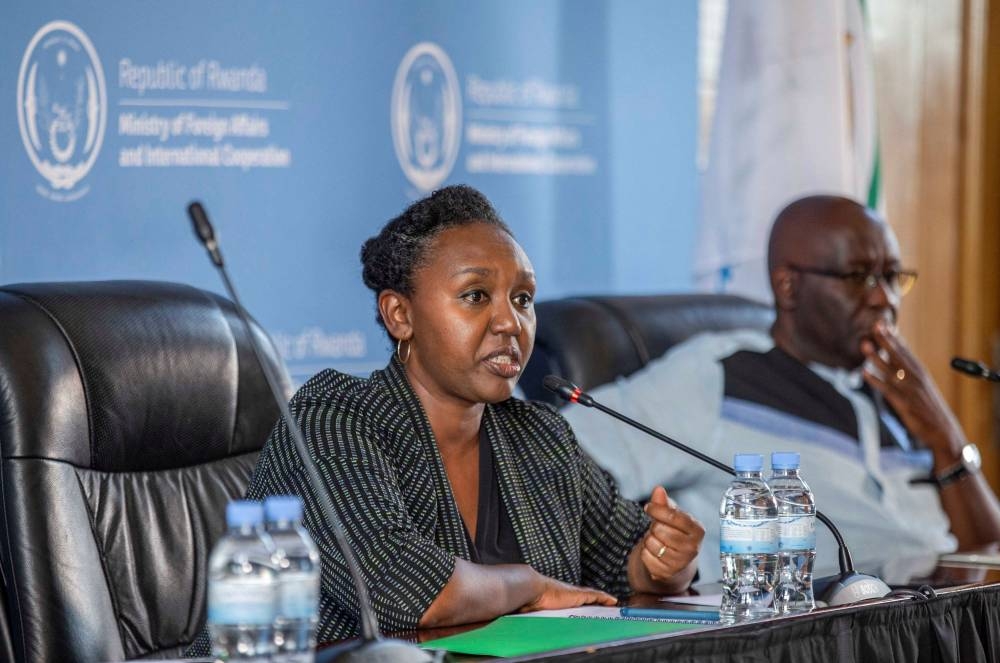 Rwanda's government spokesperson Yolande Makolo flanked by her Deputy government spokesman Alain Mukuralinda address a news conference on the transfer of asylum seekers from Britain ahead of their arrival in Kigali, Rwanda June 14, 2022. — Reuters pic