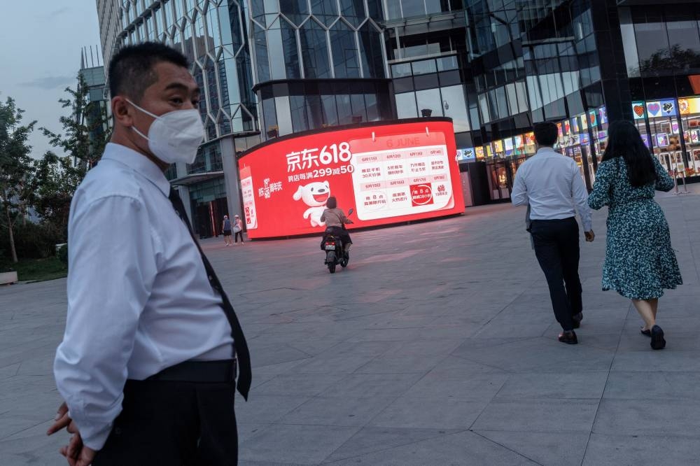 Covid cases have crept up in China's capital, many linked to a local bar. — Reuters pic