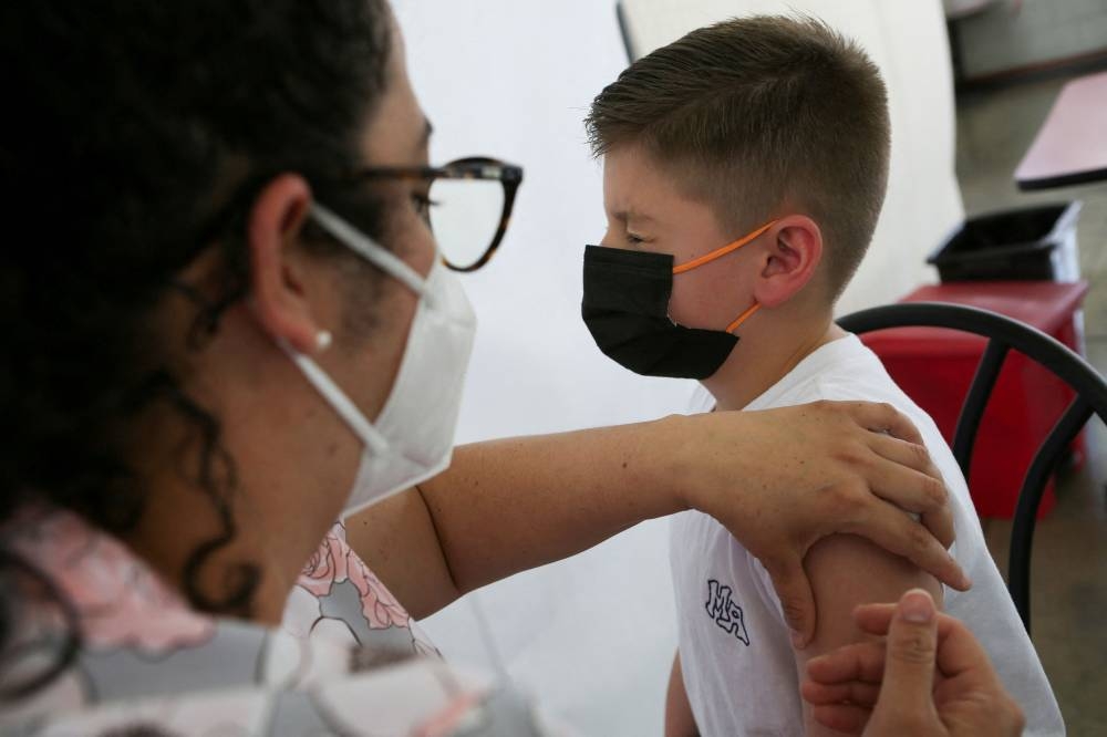 The US government is planning for a June 21 start to its under-5 vaccination campaign should the vaccines from Moderna Inc and Pfizer/BioNTech receive FDA authorisation. — Reuters pic