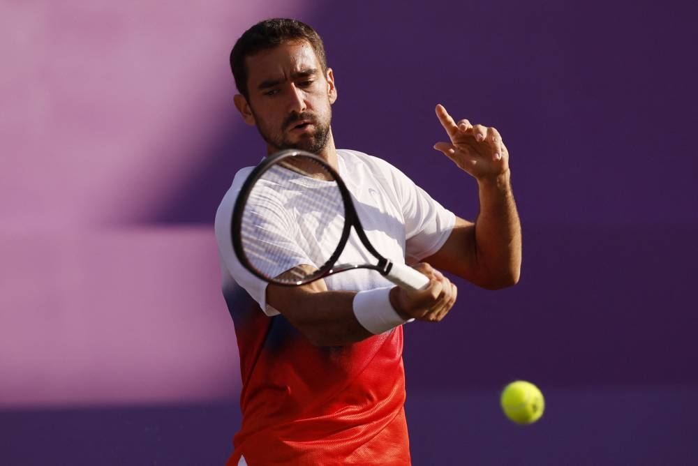 Former Wimbledon finalist Cilic into Queen's last eight