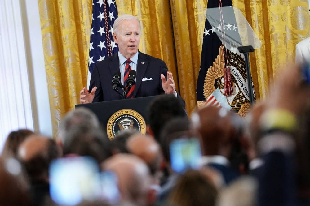 Biden blasts oil refiners for record profits on pain at the pump