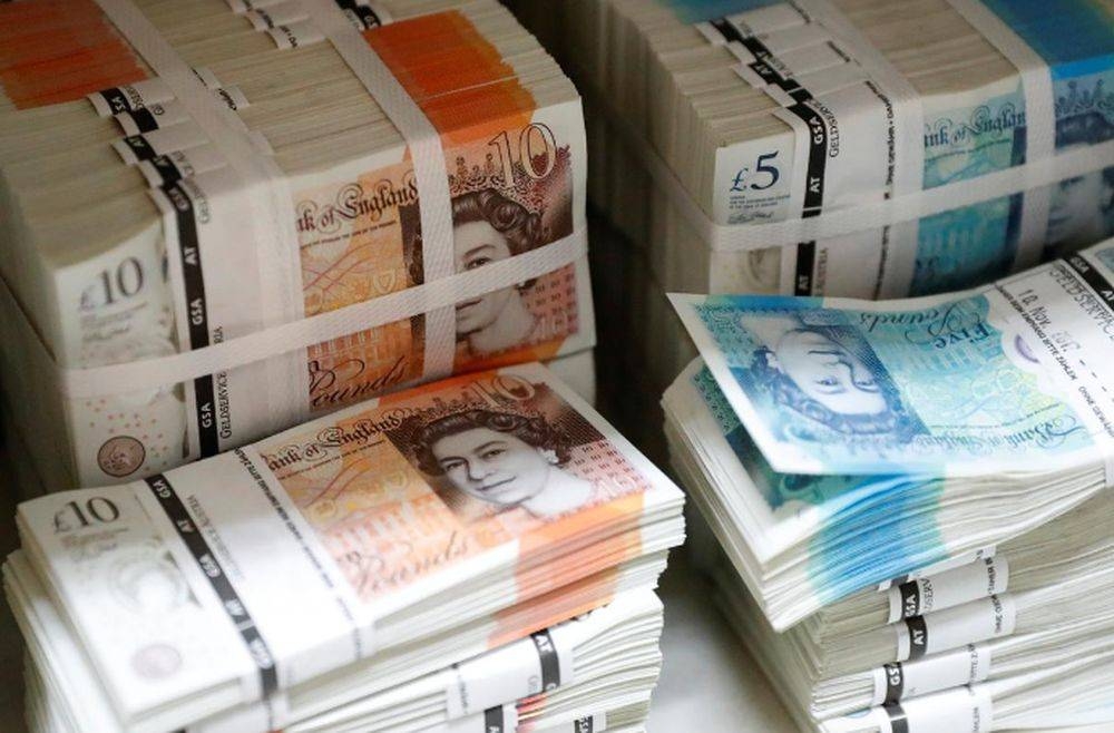 Sterling slides ahead of Bank of England rate call