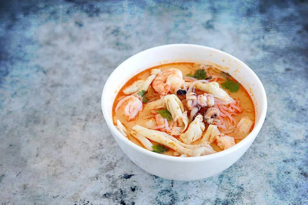 The secret to this sweet and creamy seafood ‘tom yam’? (Shhh... it's ‘gula Melaka’!)