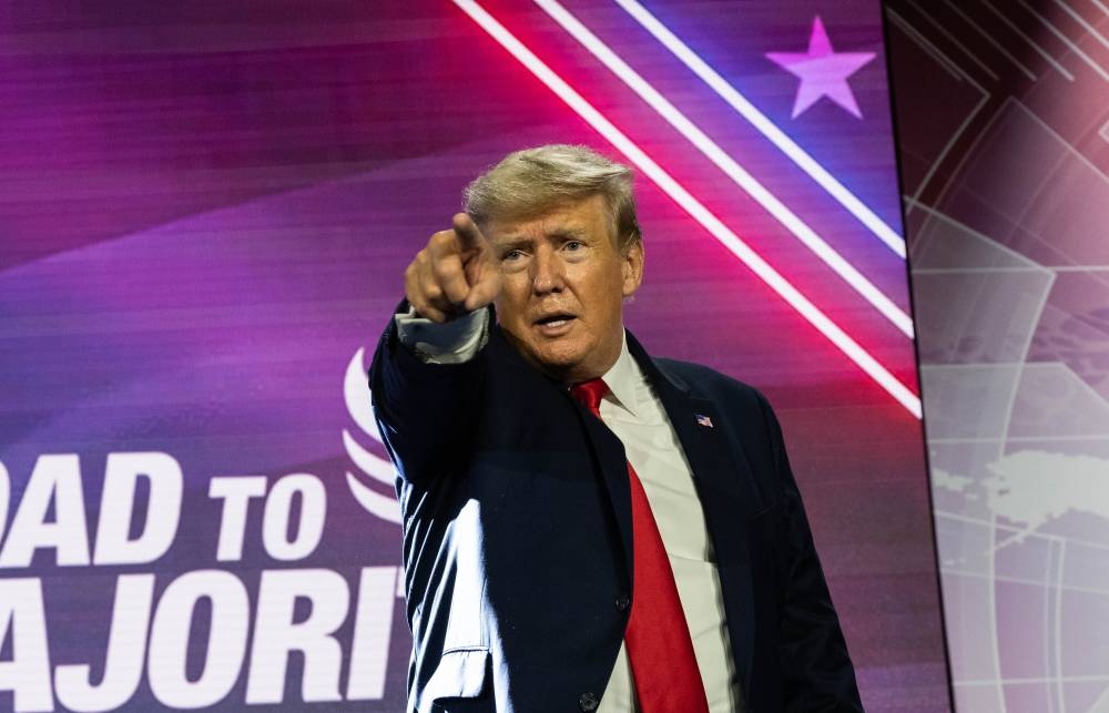 Former US President Donald Trump points to the crowd after giving the keynote address at the Faith & Freedom Coalition during their annual ‘Road To Majority Policy Conference’ in Nashville, Tennessee on June 17, 2022. ― AFP pic