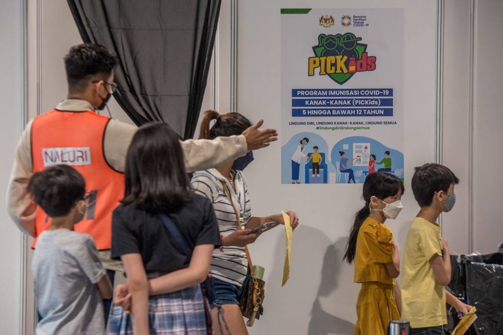 Children aged between five and 12 years old get their Covid-19 vaccine during the National Covid-19 Immunisation Programme for Kids (PICKids) at Axiata Arena in Bukit Jalil February  3, 2022. —  Picture by Shafwan Zaidon