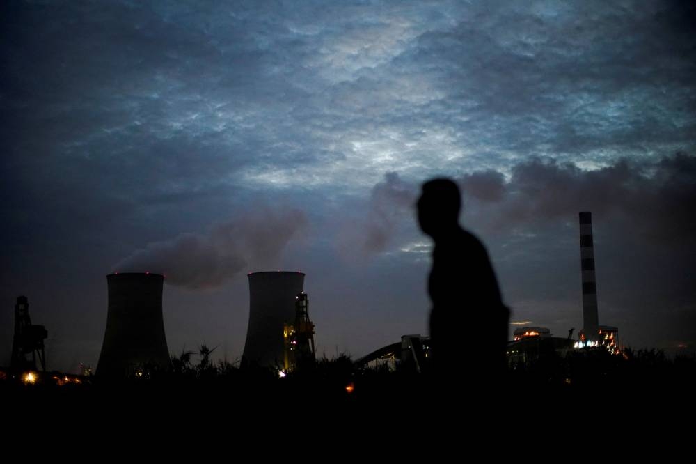 The maximum power demand load in Henan, which has a population of nearly 100 million people, set a new record of 65.34 million kilowatts yesterday, state television reported today. — Reuters pic