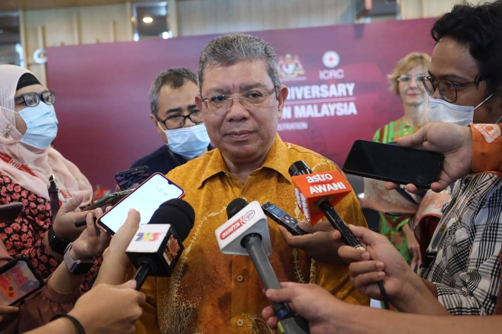 Foreign minister Datuk Seri Saifuddin Abdullah speaks to the press in Putrajaya June 9, 2022. — Bernama pic