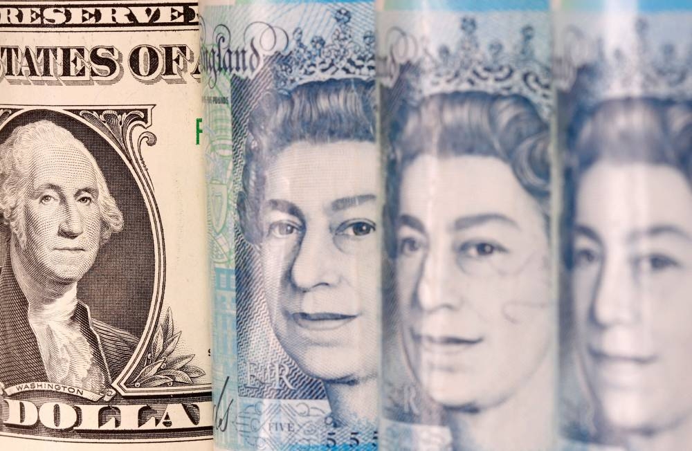 Pound and US dollar banknotes are seen in this illustration taken January 6, 2020. — Reuters pic