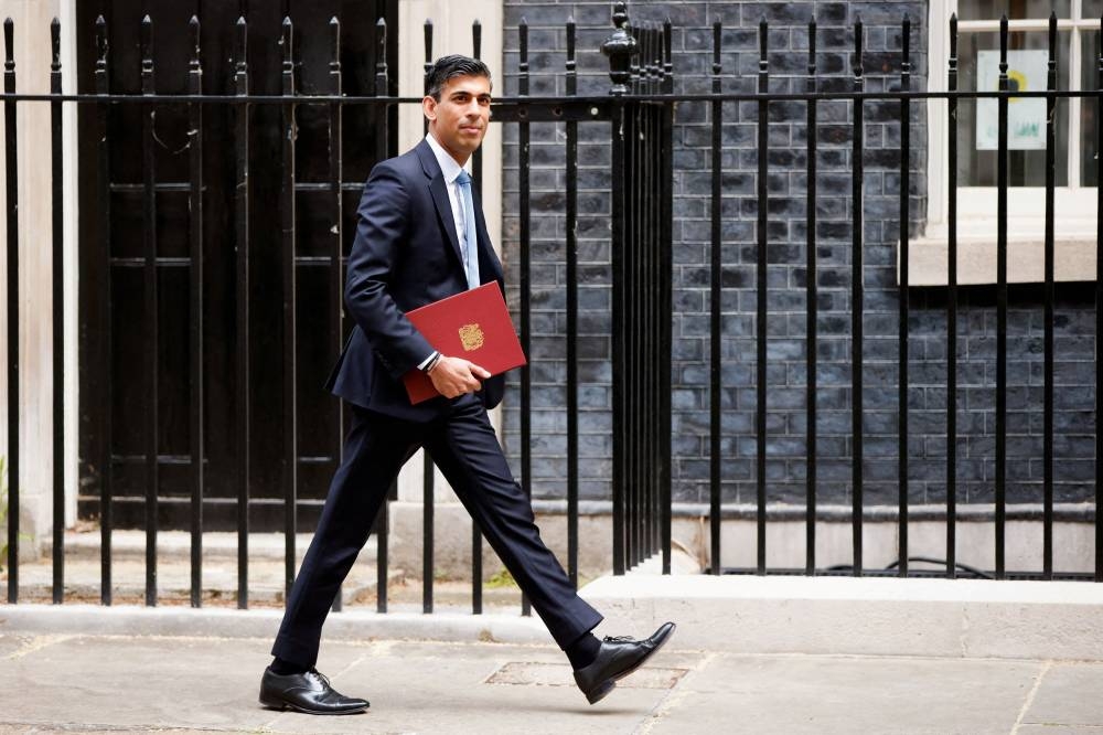 British Chancellor of the Exchequer Rishi Sunak leaves Downing Street, in London, Britain, May 26, 2022. — Reuters pic