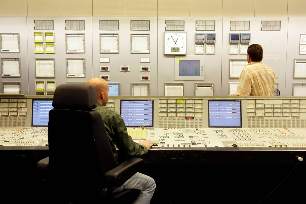 Employees work in the control room of reactor block A at the nuclear powerplant in Biblis in this file picture taken on September 18, 2008. — Reuters pic