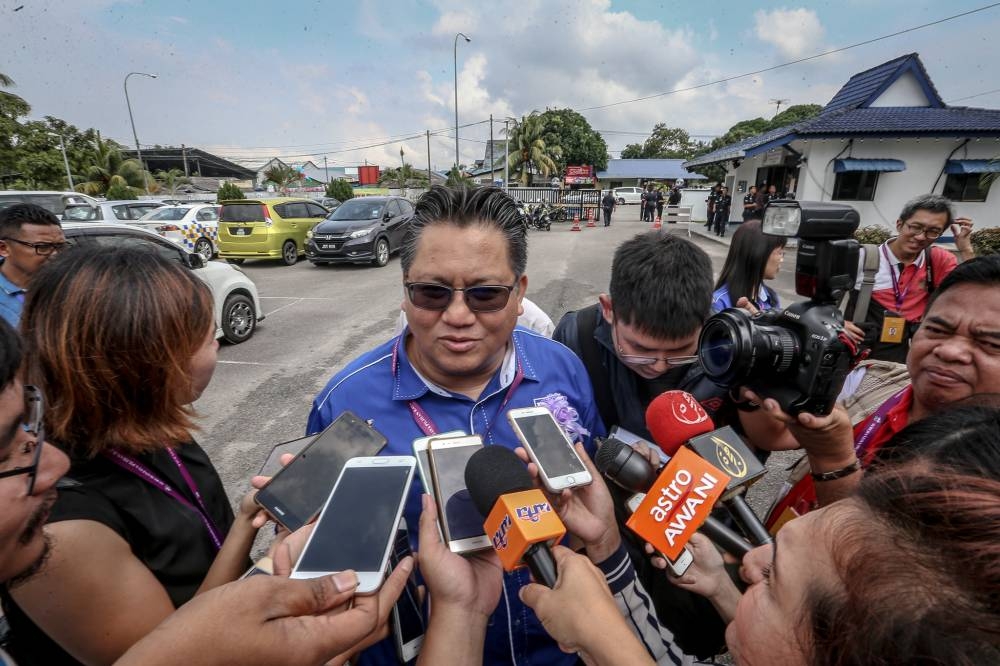 Deputy Home Minister Datuk Nur Jazlan Mohamed is pictured at the polling center to observe the polls for the early 14th General Election at Marine Police Region II Headquarters in Tampoi. — File picture by Hari Anggara