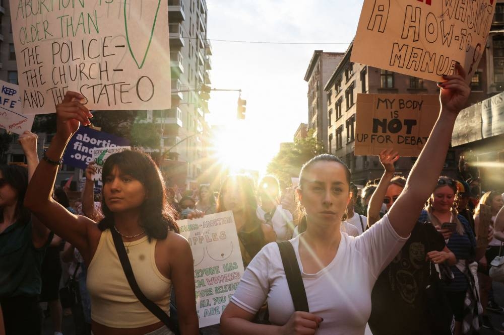 Abortion rights supporters protest in New York after the United States Supreme Court ruled in the Dobbs v Women's Health Organisation abortion case, overturning the landmark Roe v Wade abortion decision, in New York June 24, 2022. ― Reuters pic