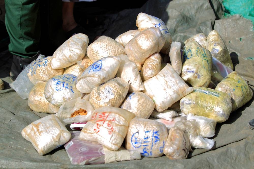 Narcotic substances seized by security forces loyal to Yemen’s Houthi rebels are displayed before being incinerated in a bonfire, in the Houthi-held capital Sanaa on June 26, 2022, the United Nations’ designated ‘International Day Against Drug Abuse and Illicit Trafficking’. — AFP pic