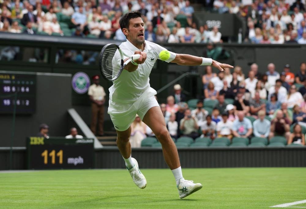 Djokovic drops set on way into Wimbledon second round