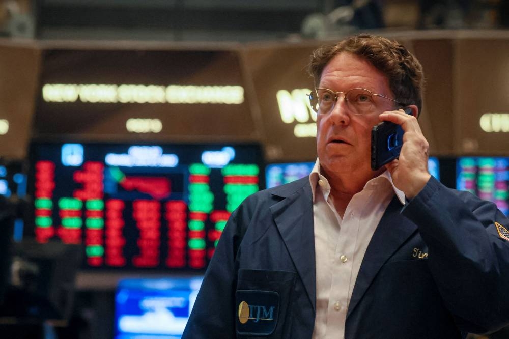 A trader works on the floor of the New York Stock Exchange (NYSE) in New York City June 27, 2022. — Reuters pic 