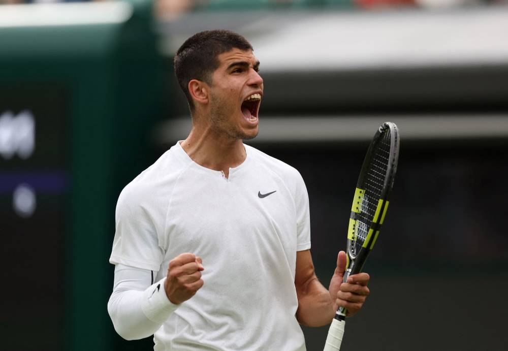 Alcaraz fights back as Djokovic racks up 80th Wimbledon win