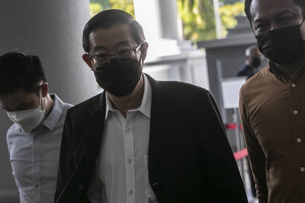 In corruption trial, former company director tells court he prepared forged documents for cash payments paid as bribes to Guan Eng