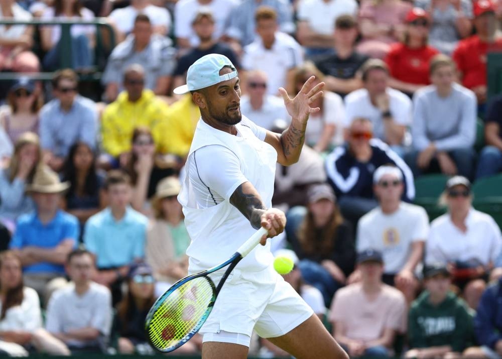 Australia’s Nick Kyrgios in action during his first round match against Britain’s Paul Jubb at the All England Lawn Tennis and Croquet Club, London, Britain, June 28, 2022. — Reuters pic 