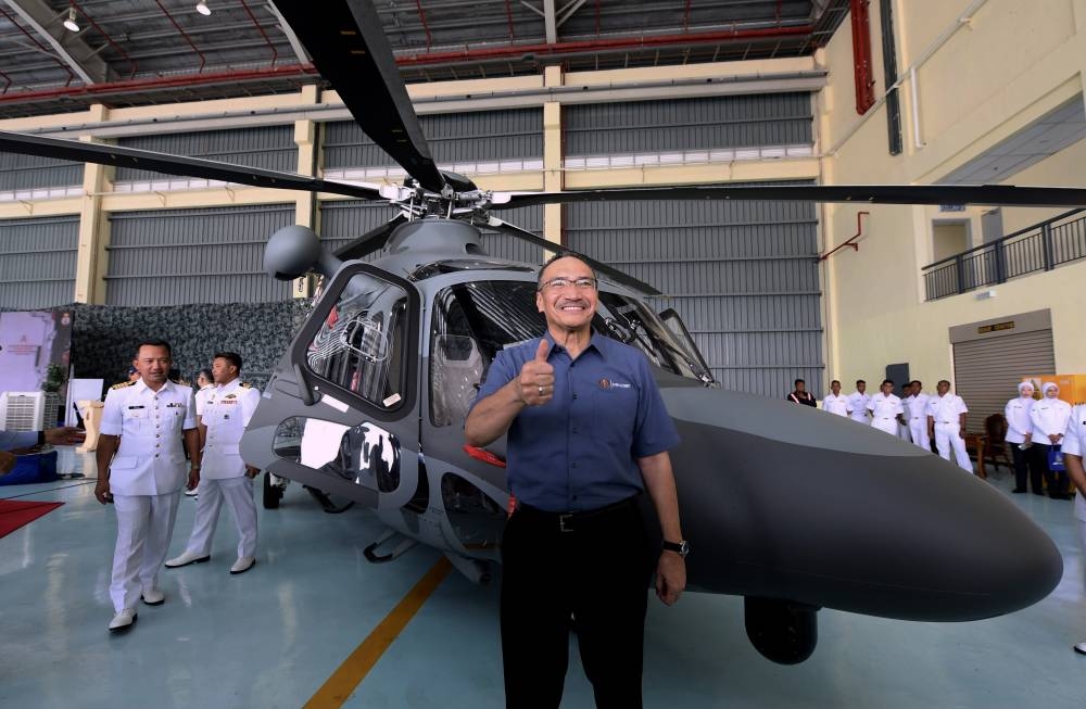 Senior Minister of Defense Datuk Seri Hishammuddin Hussein after the handing over ceremony of the Maritime Operations Helicopter to the Royal Malaysian Navy (RMN) at the East Fleet Command Headquarters of the RMN Kota Kinabalu Sepanggar Base July 1, 2022. — Bernama pic