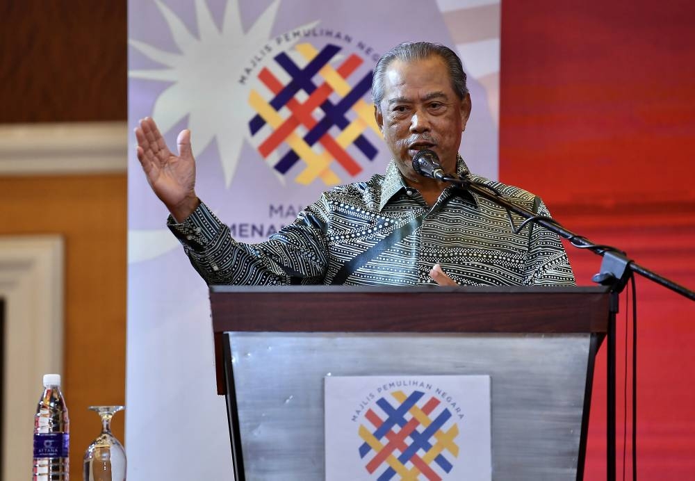 MPN Chairman Tan Sri Muhyiddin Yassin delivering a speech at the Dialogue Council with community leaders, representatives of business associations and non -governmental organisations (NGOs) in Kota Baru, July 2, 2022. — Bernama pic