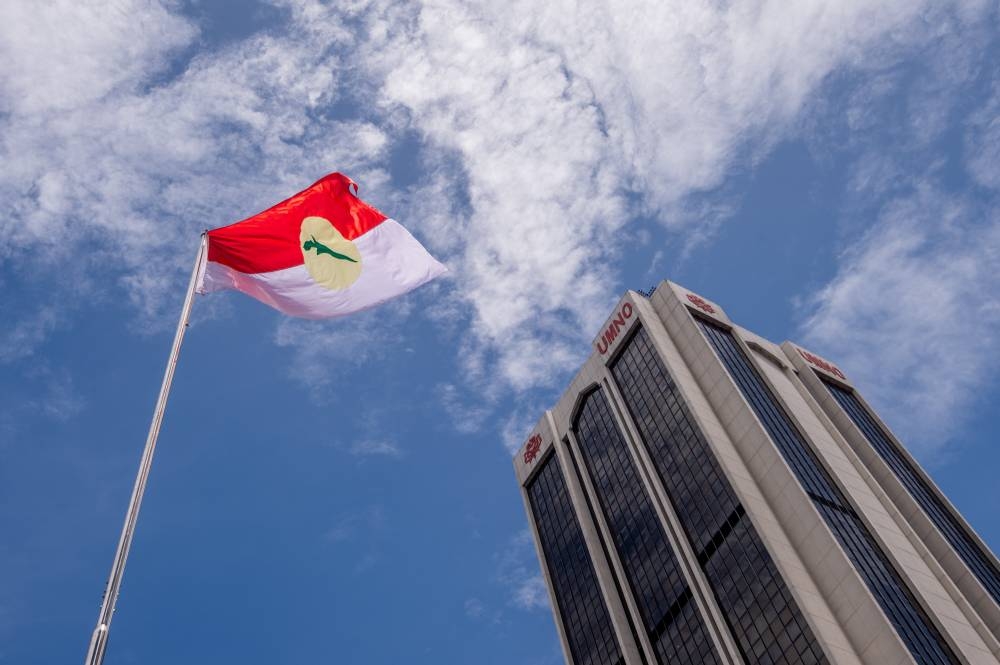 An Umno flag is seen at the World Trade Centre Kuala Lumpur March 18, 2022. — Picture by Shafwan Zaidon