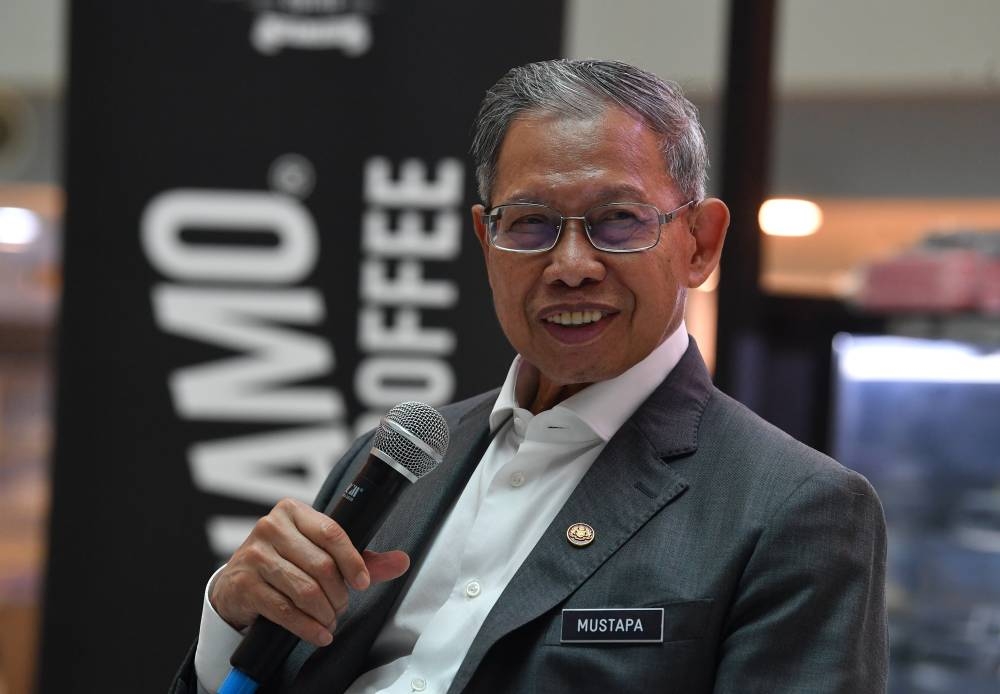 Minister in the Prime Minister’s Department (Economy) Datuk Seri Mustapa Mohamed speaks to the media in Putrajaya, July 6, 2022. — Bernama pic 