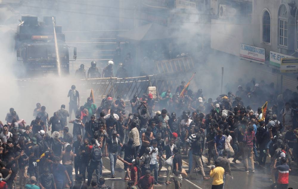 Police use tear gas and water cannons to disperse demonstrators during a protest demanding the resignation of President Gotabaya Rajapaksa, amid the country’s economic crisis, near the president's residence in Colombo, Sri Lanka, July 9, 2022. ― Reuters pic pic