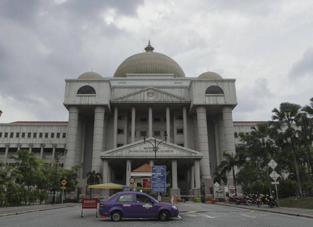 The duo will be charged in the Cyber Court of the Kuala Lumpur Court Complex. — Picture by Yusof Mat Isa