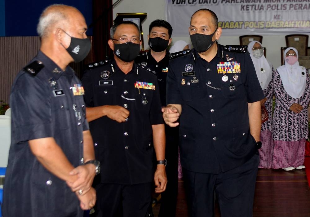 Perak police chief Datuk Mior Faridalathrash Wahid (right) said the 34-year-old driver had traffic summonses from 2008 until last year, three of which were related to road accidents. — Bernama pic