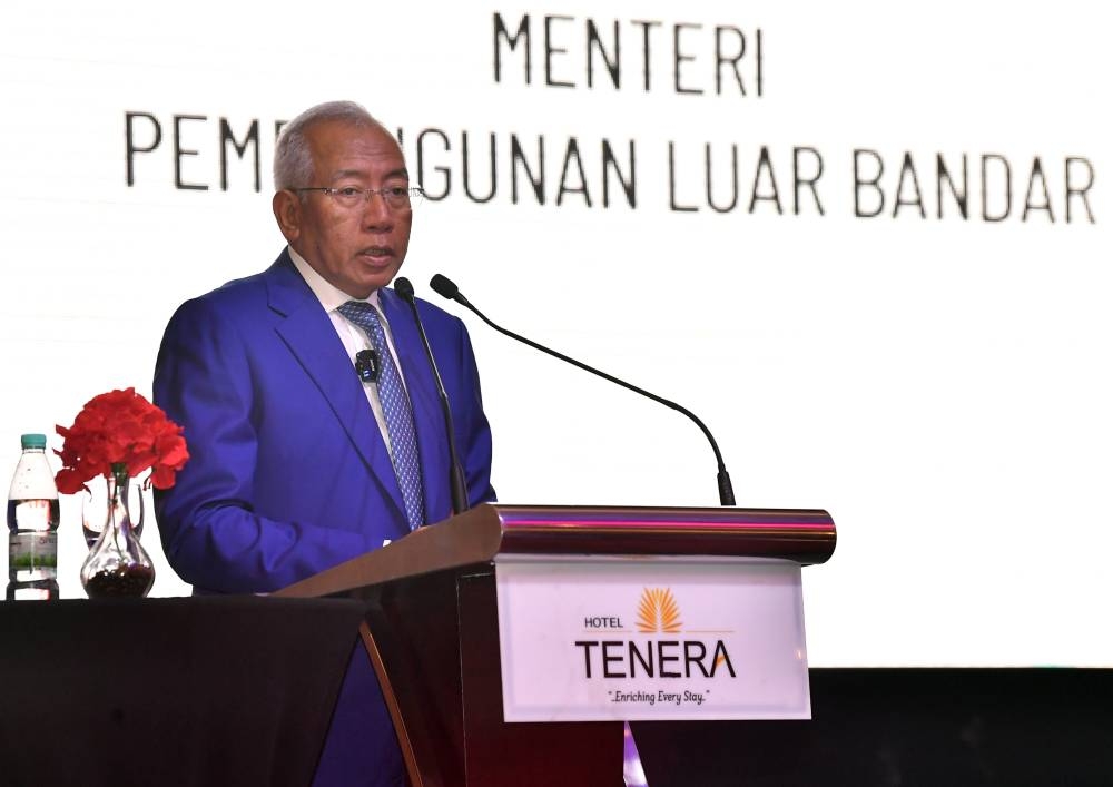 Datuk Seri Mahdzir Khalid speaks at a presentation ceremony to honour outstanding Orang Asli students in Bangi, July 15, 2022. — Bernama pic 