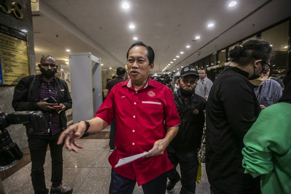 Umno secretary-general Datuk Seri Ahmad Maslan speaks to reporters at Umno headquarters Kuala Lumpur June 24, 2022. - Picture by Hari Anggara