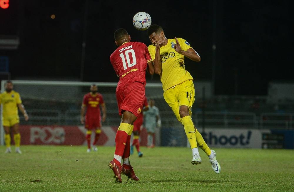 Penang FC player Rafael Vitor Santos De Freitas in action against a Selangor FC player at Stadium Majlis Bandaraya Petaling Jaya, July 16, 2022. — Bernama pic