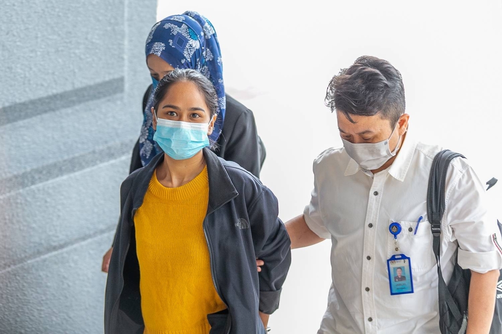 The bail was posted for Siti Nuramira Abdullah, 26, and V. Alexander Navin, 38, respectively at the Kuala Lumpur Court Complex and the Petaling Jaya court. — Picture by Devan Manuel