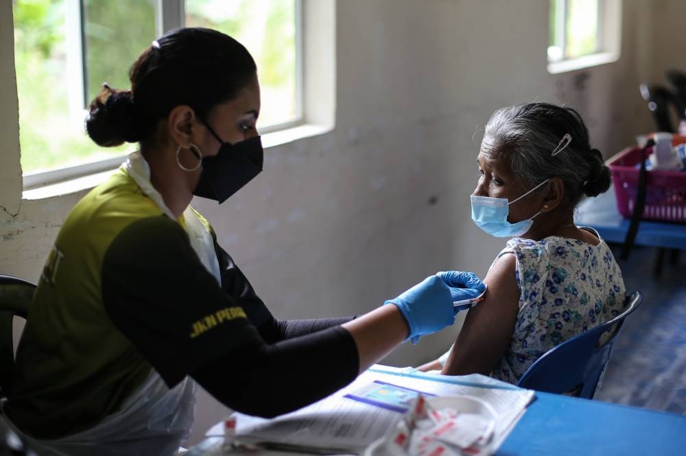 Health Minister Khairy Jamaluddin said so far, a total of 225,848 people in the permitted groups have received a second booster dose. —Picture by Ahmad Zamzahuri