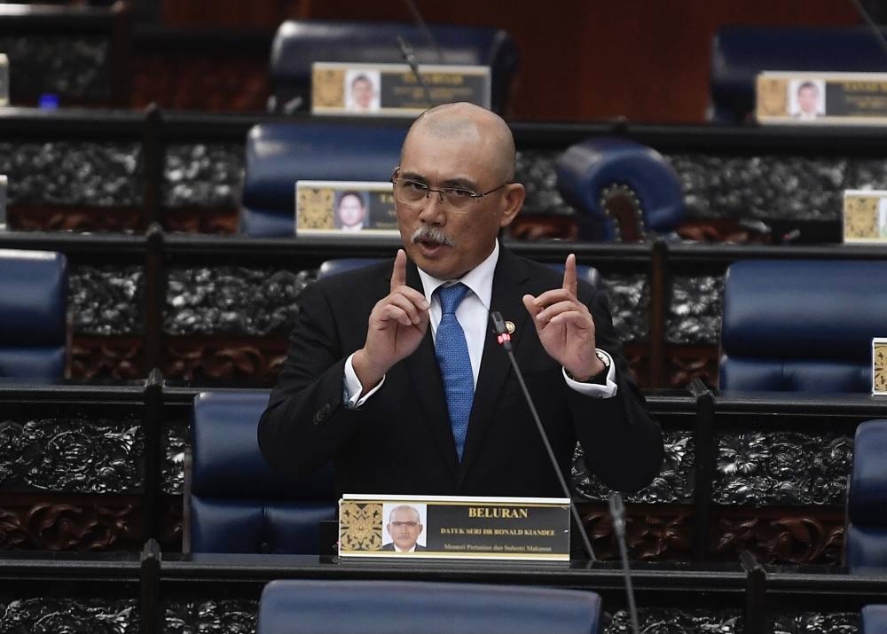 Agriculture and Food Industry Minister Datuk Seri Ronald Kiandee winding up the debate on the Control of Padi and Rice (Amendment) Bill 2022 at the Dewan Rakyat, July 19, 2022. — Bernama pic 