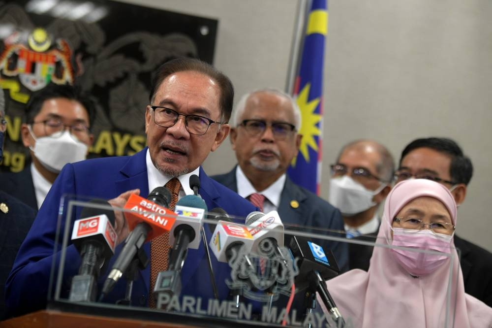 Opposition Leader Datuk Seri Anwar Ibrahim speaks during a press conference at Parliament, Kuala Lumpur July 20, 2022. — Bernama pic