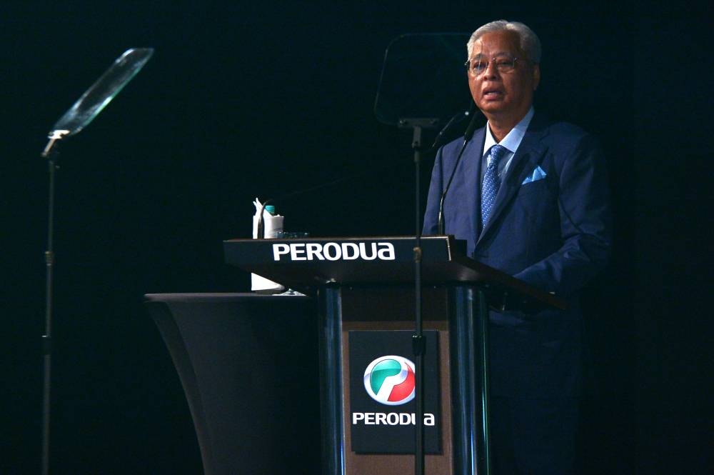 Prime Minister Datuk Seri Ismail Sabri Yaakob delivers his speech during the official launch of the new Perodua Alza at the Kuala Lumpur Convention Centre in Kuala Lumpur July 20, 2022. — Picture by Shafwan Zaidon