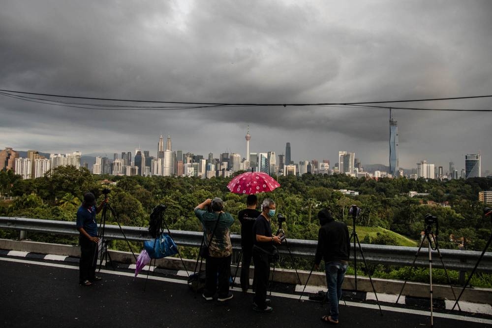 A view of the city skyline during monsoon season in Kuala Lumpur on October 21, 2021. — Picture by Firdaus Latif   