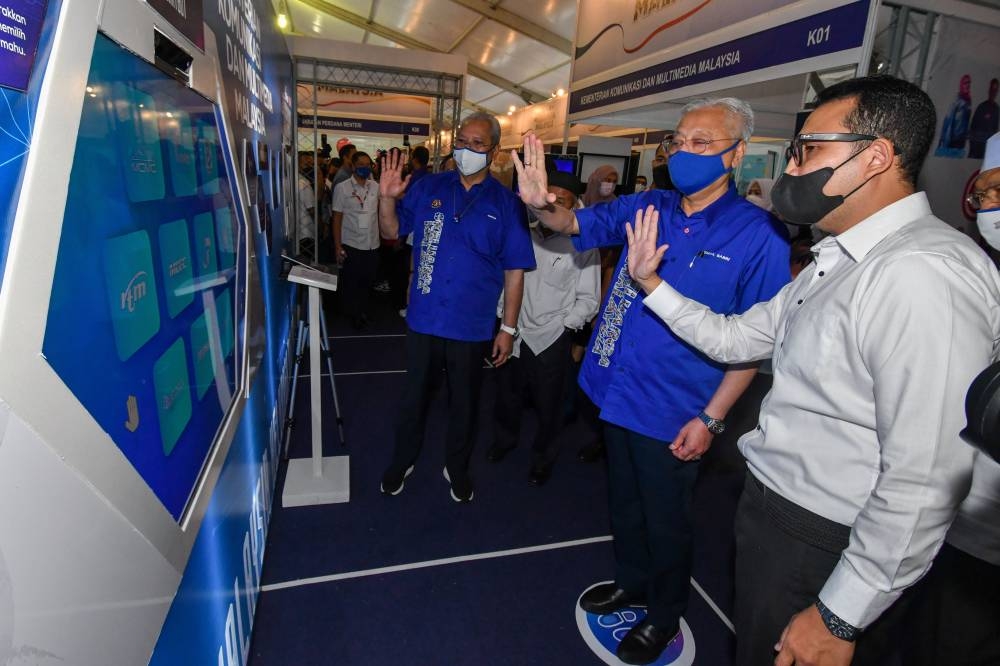 Prime Minister Datuk Seri Ismail Sabri Yaakob (second right) at the opening ceremony of the Kelantan Keluarga Malaysia Aspirations Tour, at the Sultan Muhammad IV Stadium in Kota Baru July 23, 2022. — Bernama pic