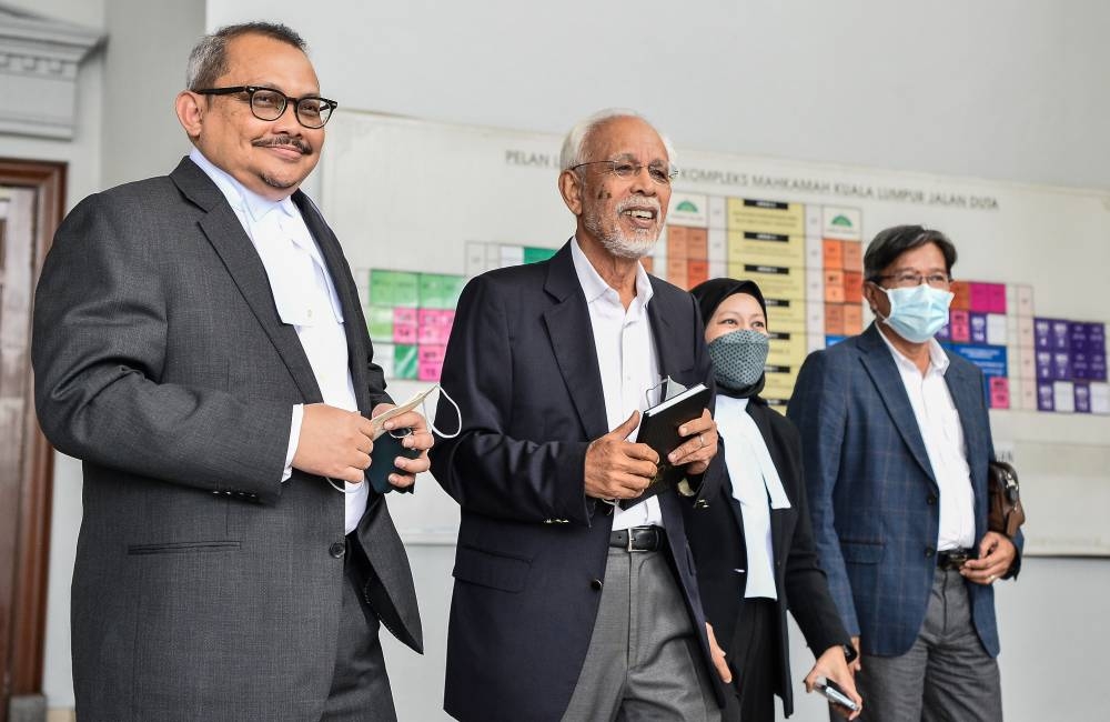 Former Felda chairman Tan Sri Shahrir Ab Samad (second, left) is seen leaving the Kuala Lumpur Court Complex on the first day of his trial in connection with a money laundering case involving RM1 million from former prime minister Datuk Seri Najib Razak, July 26, 2022. — Bernama pic 