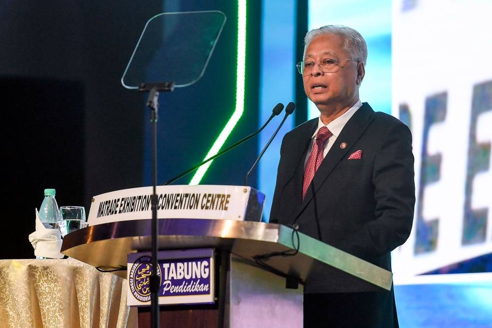 Prime Minister Datuk Seri Ismail Sabri Yaakob delivers a speech at PTPTN’s 25th Silver Jubilee Celebration at the Matrade Exhibition and Convention Centre in Kuala Lumpur, July 27, 2022. — Bernama pic 