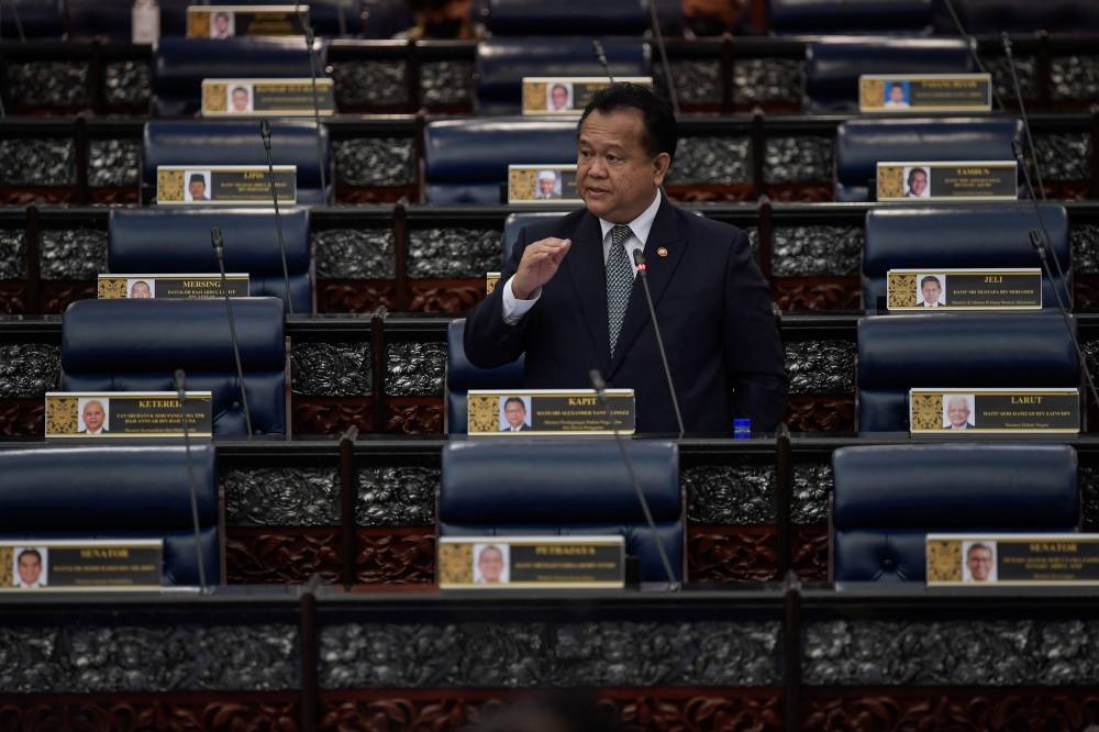 Datuk Seri Alexander Nanta Linggi addresses members of Parliament in Kuala Lumpur July 28, 2022. — Bernama pic